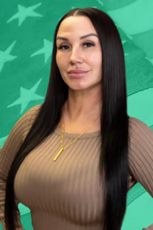 Woman in tan sweater